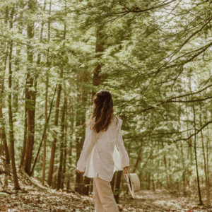 Woman walking in the forest